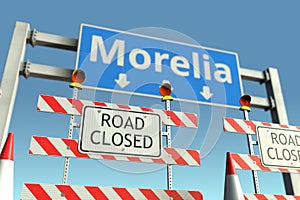 Road barricades near Morelia city road sign. Lockdown in Mexico conceptual 3D rendering