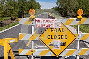 Road barriers indicate closure of Illinois state campground during coronavirus outbreak