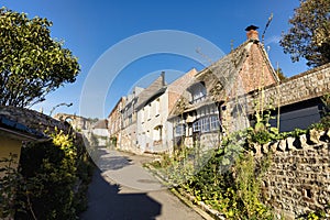 road with beautiful old houses in Veules-les-Roses, Normandy, France