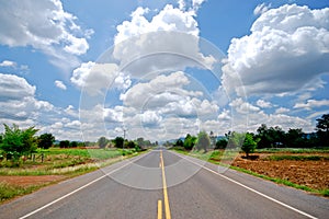 Road and big clouds