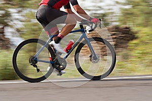 Road bike cyclist man cycling, athlete on a race cycle