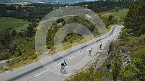 Road biking at empty highway, bikers ride bicycle fast high speed. Sportsmen