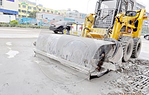 Road blade grader