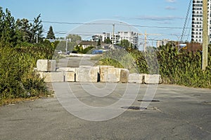 Road block with ciment blocks photo