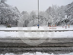Road blocked due to heavy snowfall. Impassable road covered in snow in the German town of Heiligenhaus.