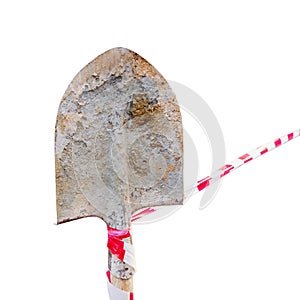 Road blocked for repair, isolated on a white background. Line stop tape tied to an old spade