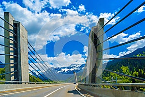 Road on the bridge among Alps mountains, Klosters-Serneus, Davos, Graubuenden Switzerland