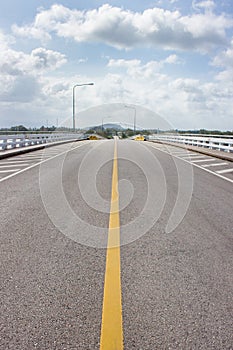 Road on the bridge and many clound in sky