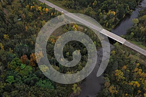 Road with Bridge Over the Snake River Through Autumn Forest