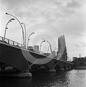 A road bridge on the Singapore river in black and white analogue film photography