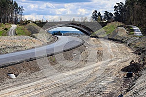 Road with bridge under construction