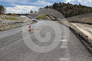 Road with bridge under construction