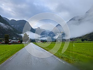 Road in Briksdal glacier valley in south Norway. Europe