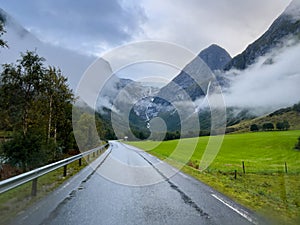 Road in Briksdal glacier valley in south Norway. Europe