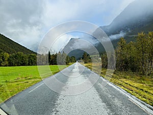 Road in Briksdal glacier valley in south Norway. Europe