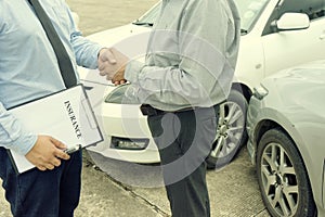 On the road car accident insurance agent examining carcrash