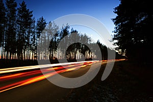 Road with car light trails