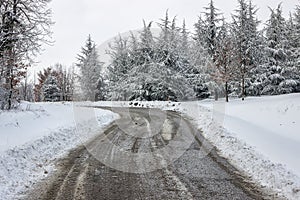 Road care, just spread mixture of salt and sand