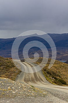 Road in chilean national park in Patagonia Torres del paine