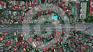 Road, city and drone of crowded population development, society or transportation. Residential street, houses in Vietnam