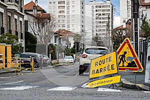 Road closed and diversion signs in French town