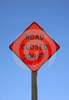 Road closed five hundred feet sign