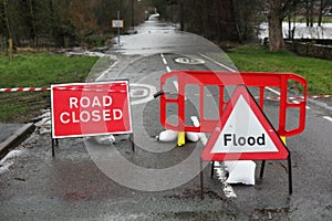 Road closed and flood sign