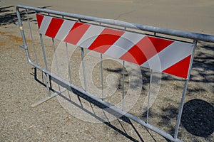 Road closed sign. Construction in process. Fenced pit on the road