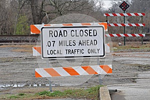 Road closed sign near railroad crossing
