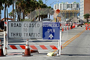 Road closed sign and road construction