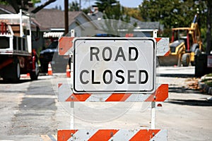 Road closed sign on street