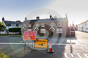 Road closure and diversion signage in UK village photo