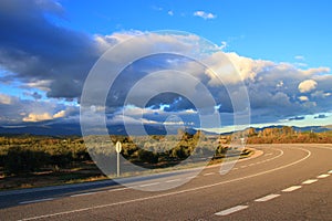 Spanish road and clouds in Countryside, Catalunia photo