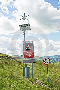 Road conditions: green energy signs.