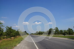 Road conditions, trees, roadside, sky, beautiful white clouds