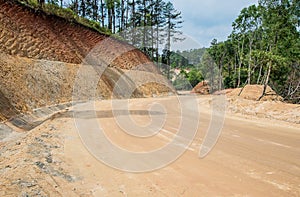 Road construction,Dirt road,New road surface.