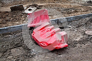 Road construction. Safety barriers on the ground