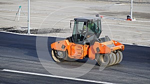 Road construction works with commercial equipment