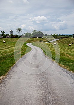 Road in the country and hay