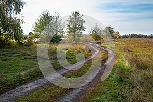 Road in the countryside on an autumn sunny day. Nature in the Kharkiv region