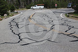 Road cracks repaired by tarmac