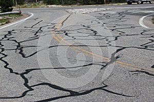 Road cracks repaired by tarmac