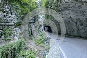 Road and creek at bottom of Brasa gorge, Tremosine, Italy