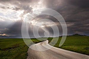 Road crosses a prairie