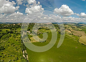 Road with cypress trees in the Val d orcia (Orcia Valley) near Pienza in Tuscany, Italy - cypress trees along the famous white