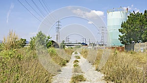 Road in a degraded part of the Zona Franca in Barcelona photo