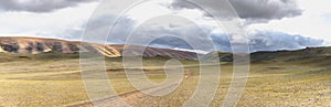 The road in the desert. Central Asia between the Russian Altai and Mongolia. Panoramic view