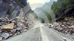 road destroyed by rockfall. natural disaster and catastrophe