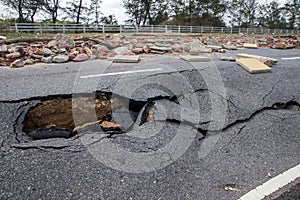 Road erosion caused by waves and severe storms