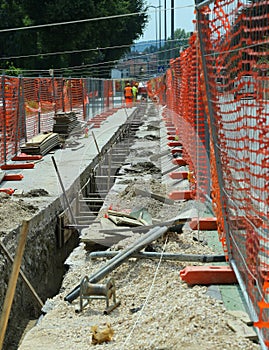 Road excavation for laying fiber optics for high speed
